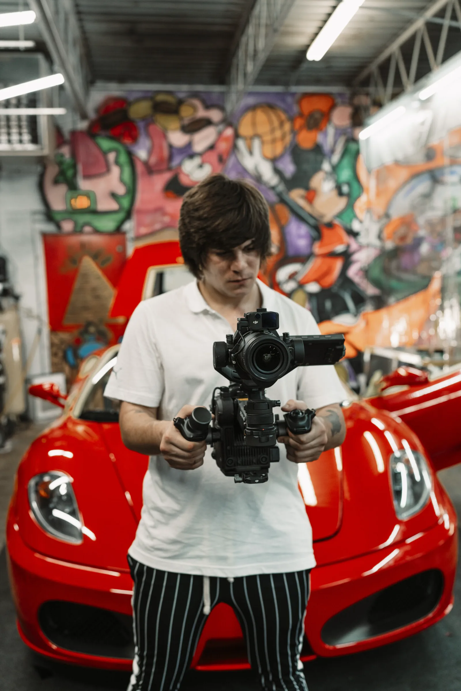 Max with the Ronin 4D in front of a Ferrari